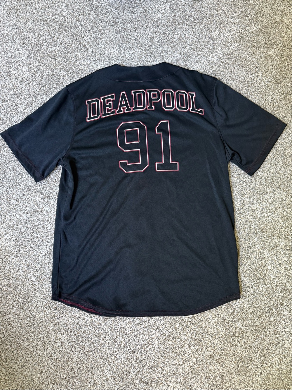 Like New Marvel Deadpool Jersey with Red-Outlined Graphics